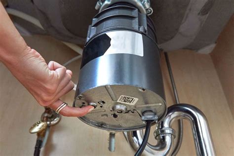 badger 100 garbage disposal reset button|Resetting a Garbage Disposal